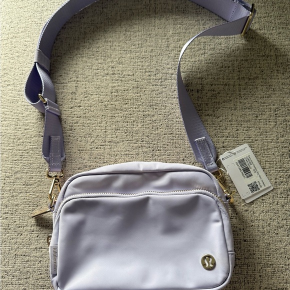lululemon athletica Handbags - Everywhere Crossbody Bag 2L (Lavender Frost/Gold)